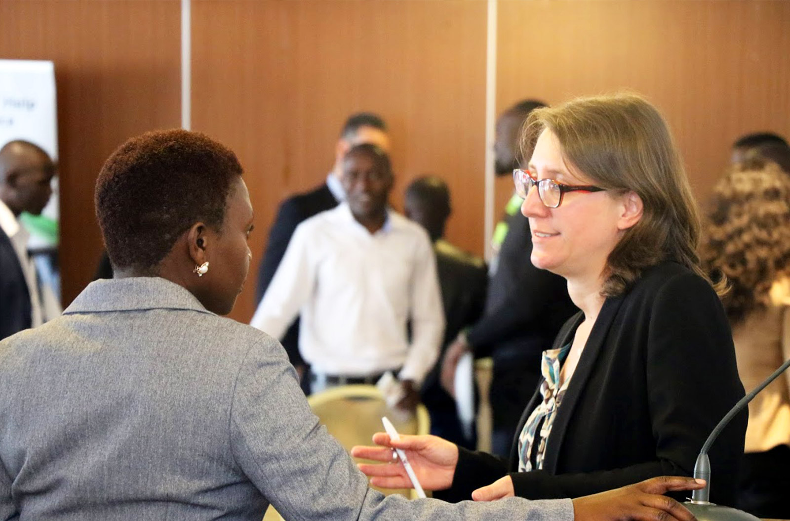 Jenny meeting people at an event