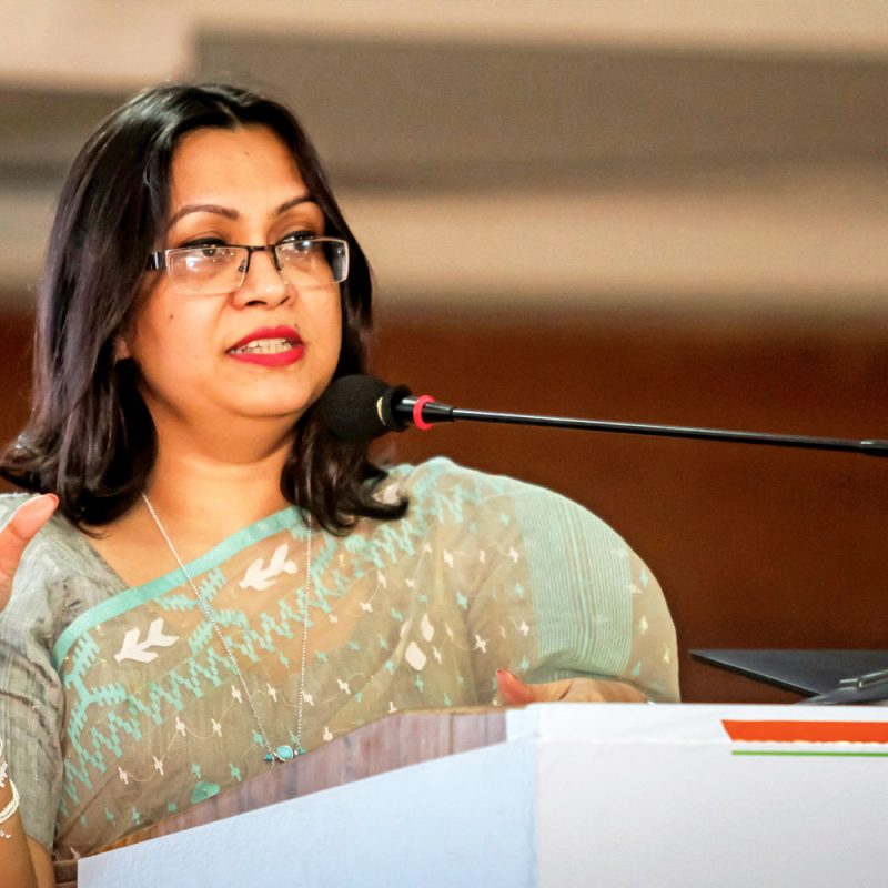 Hasin speaking at an event