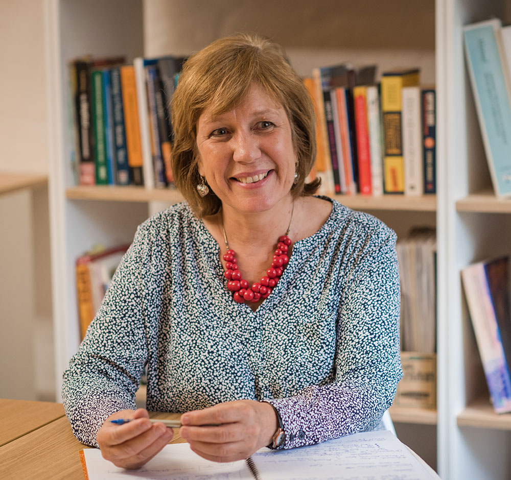 Dorcas sat in library