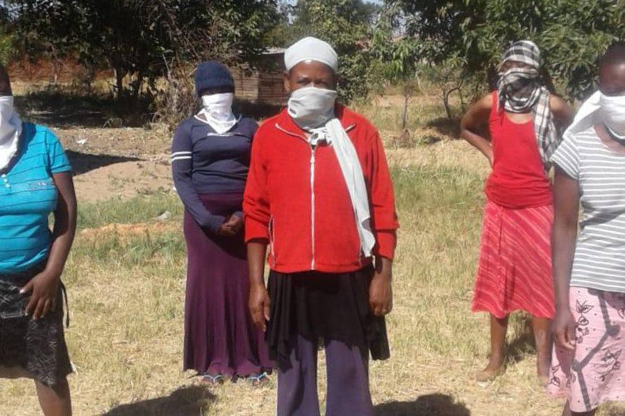 Group of African women with face coverings