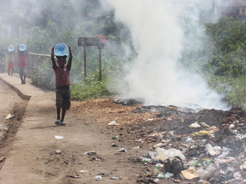 Pile of burning waste at roadside