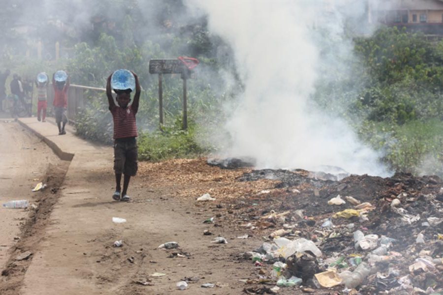 Pile of burning waste at roadside