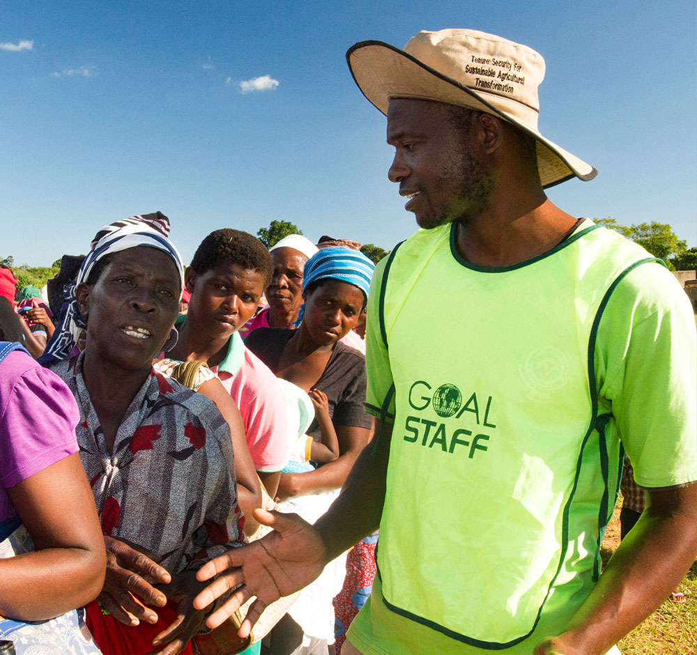 GOAL Staff distributing aid