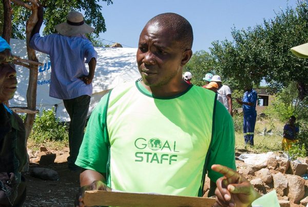 GOAL worker speaking to those in need