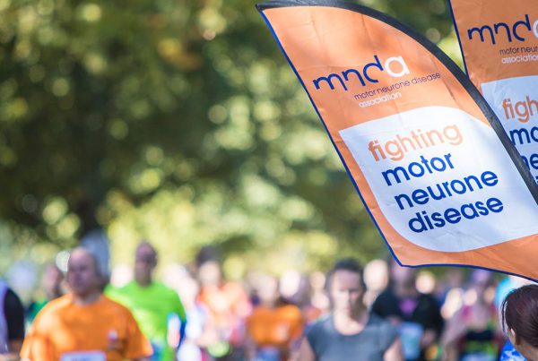 Fundraising event with MNDA flags