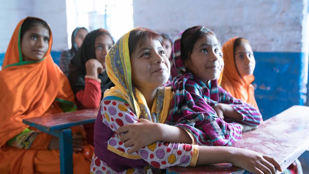 Young girls learning at Malala school