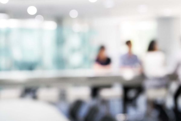 Soft focus photo of panel interview