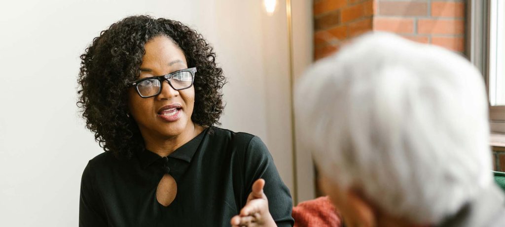 Two women in discussion