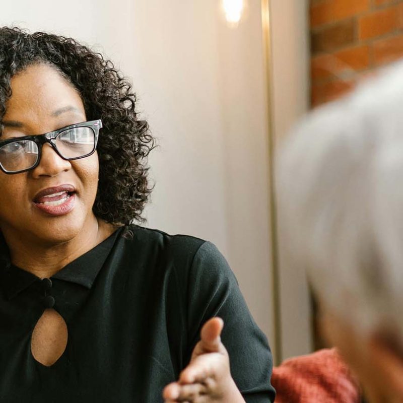 Two women in discussion