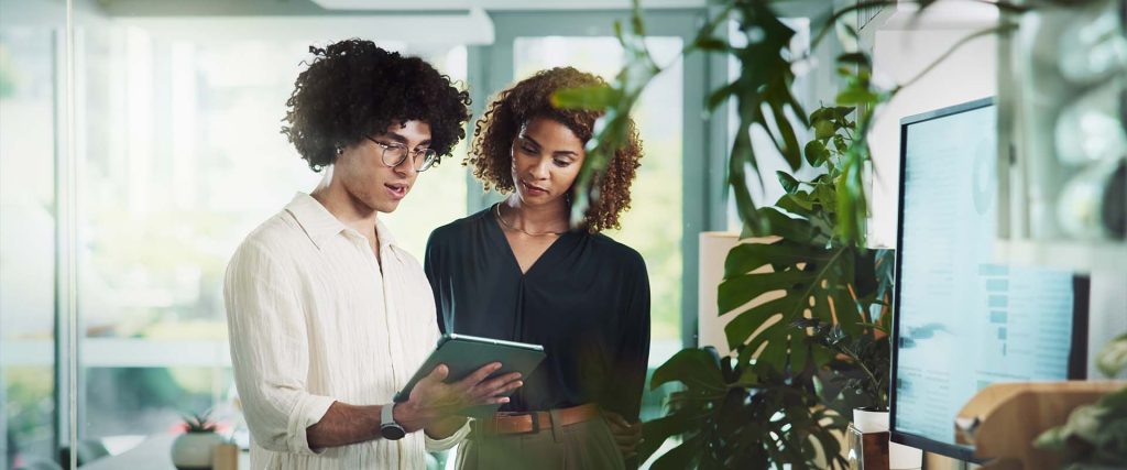 Two younger colleagues in discussion