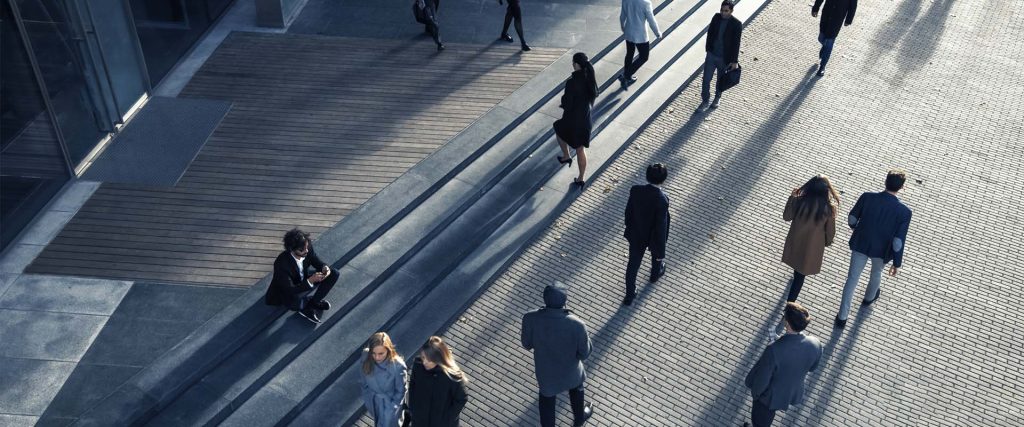 People walking through square