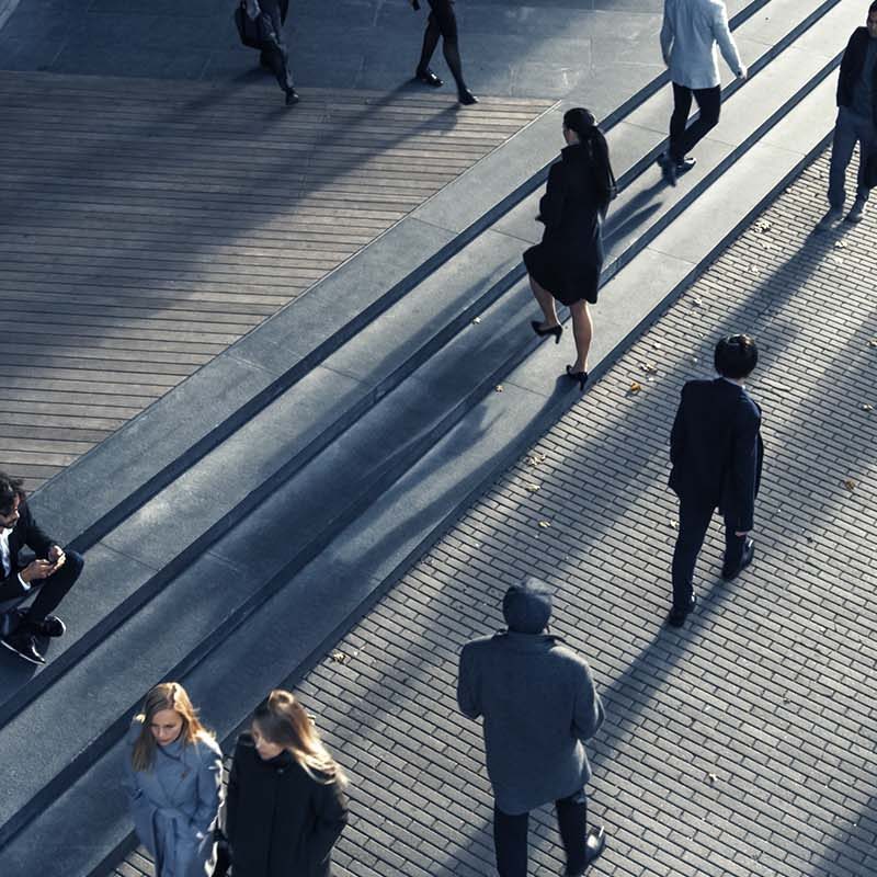 People walking through square