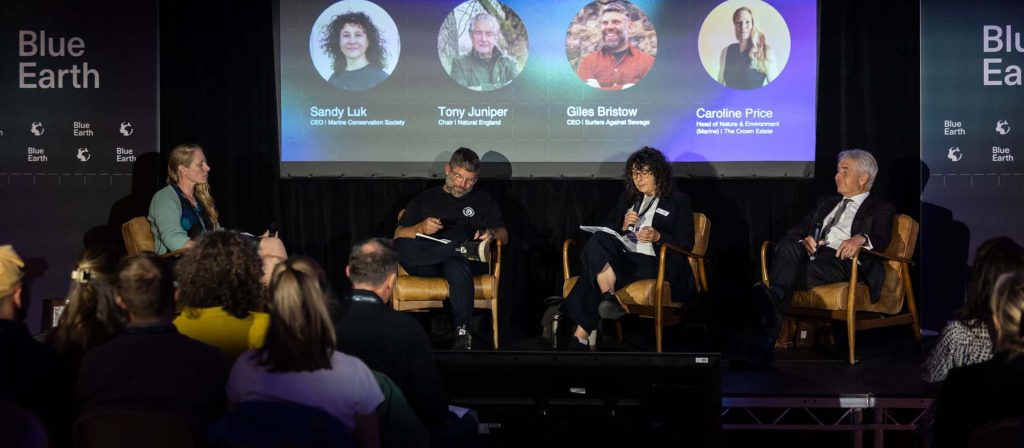 Participants on stage at Blue Earth Summit 2025