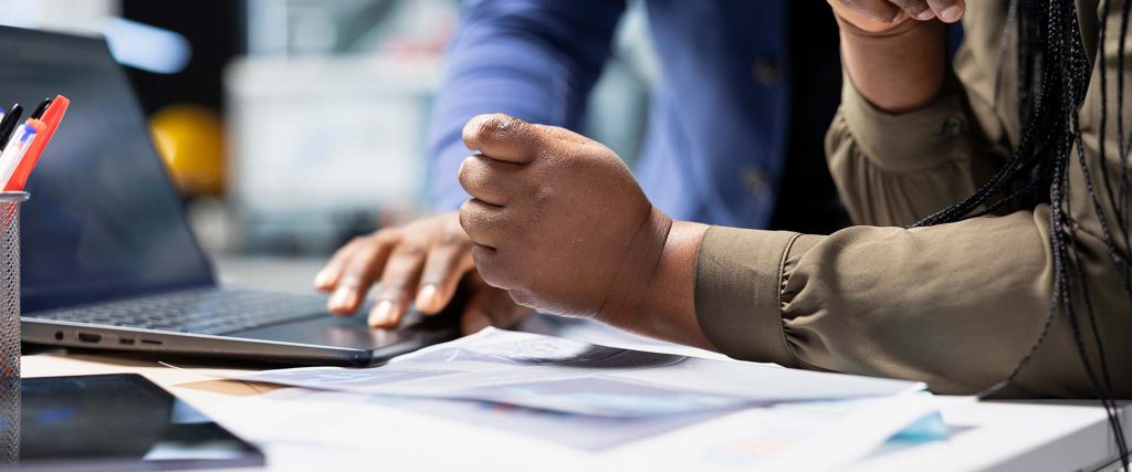 Two colleagues reviewing application