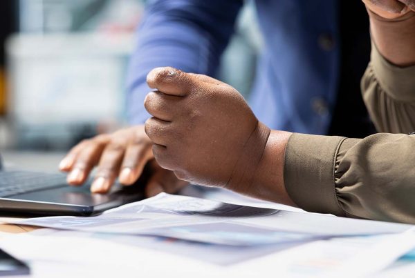Two colleagues reviewing application