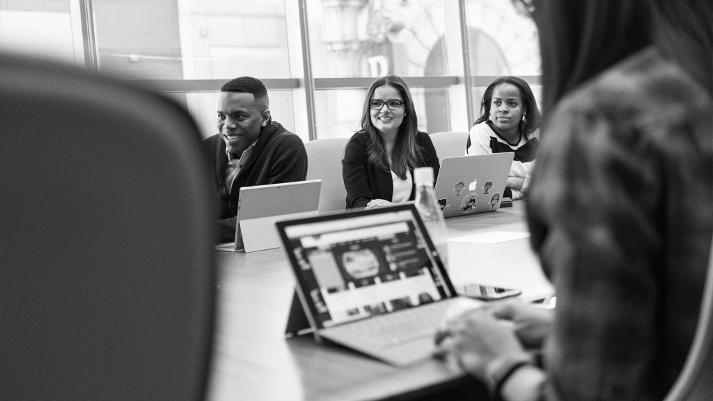 Diverse group of people in meeting