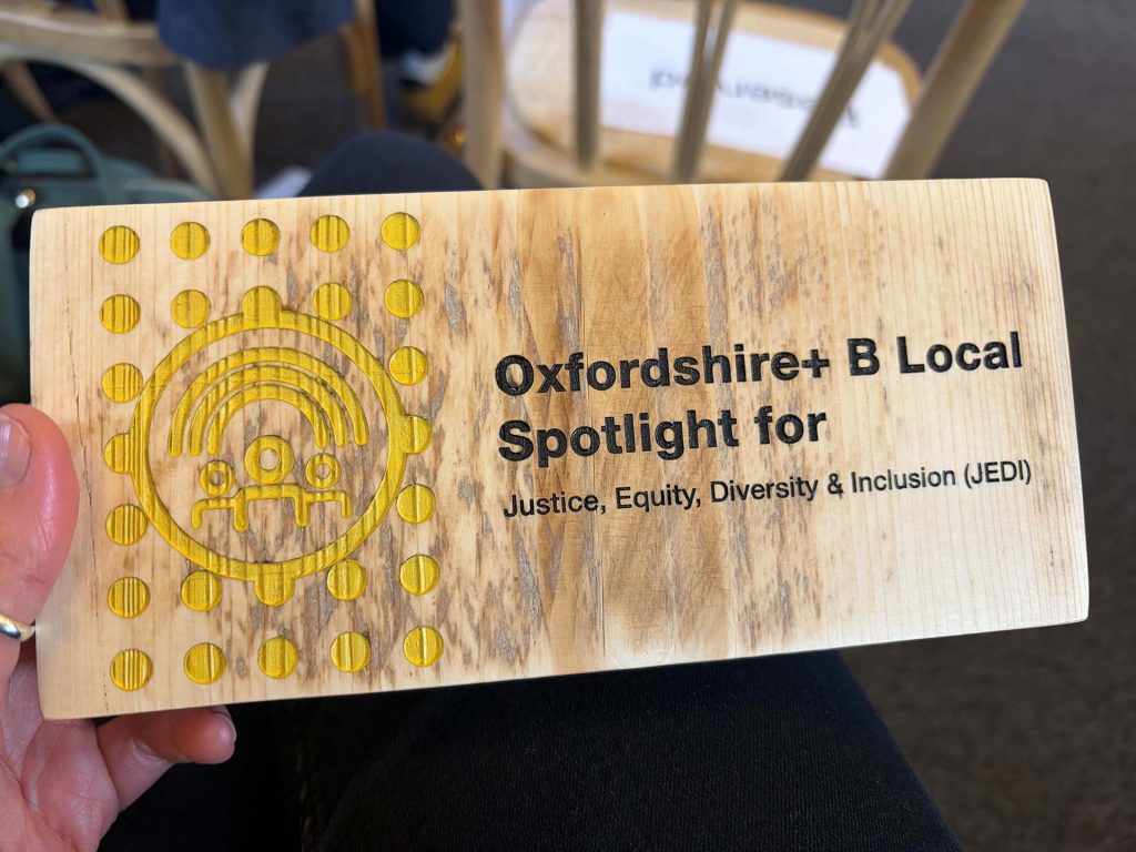 Plaque with "Oxfordshire+ B Local Spotlight for Justice, Equity, Diversity & Inclusion"