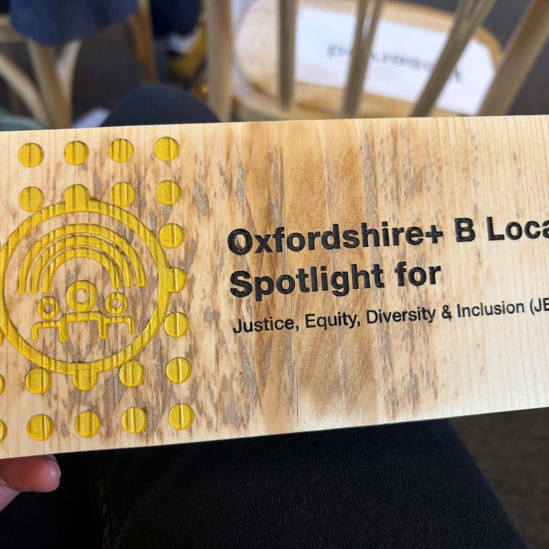 Plaque with "Oxfordshire+ B Local Spotlight for Justice, Equity, Diversity & Inclusion"