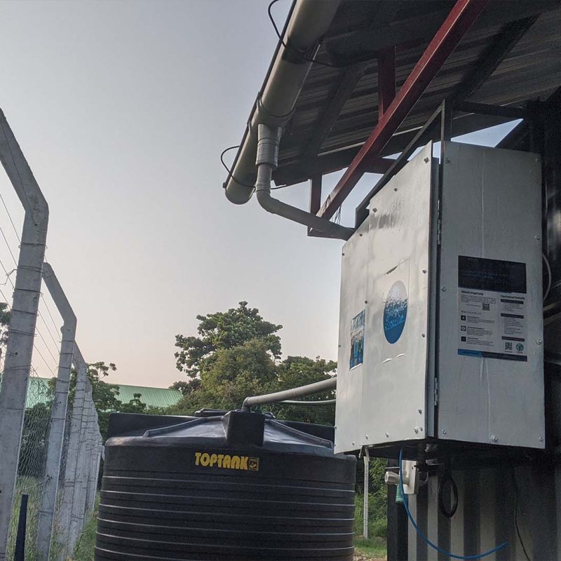 Water tank on outside of building