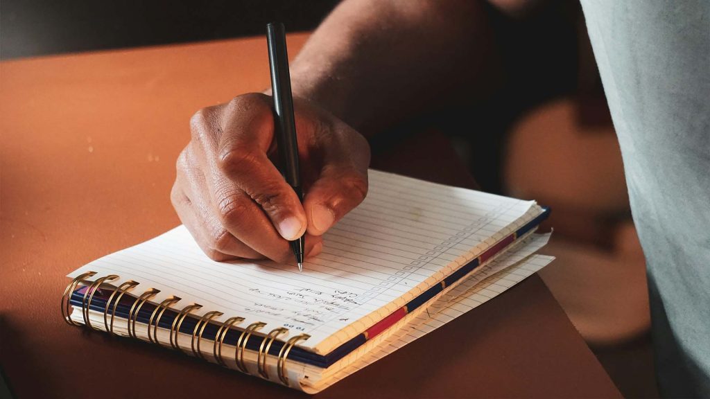 Taking notes on a notepad